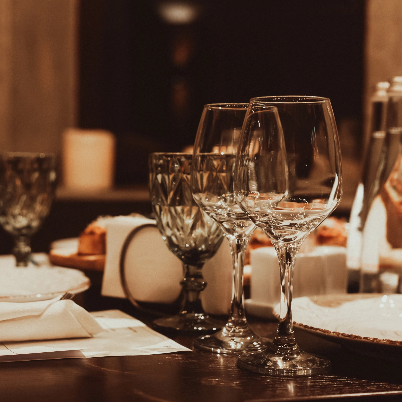 Empty wineglasses on a table in a restaurant